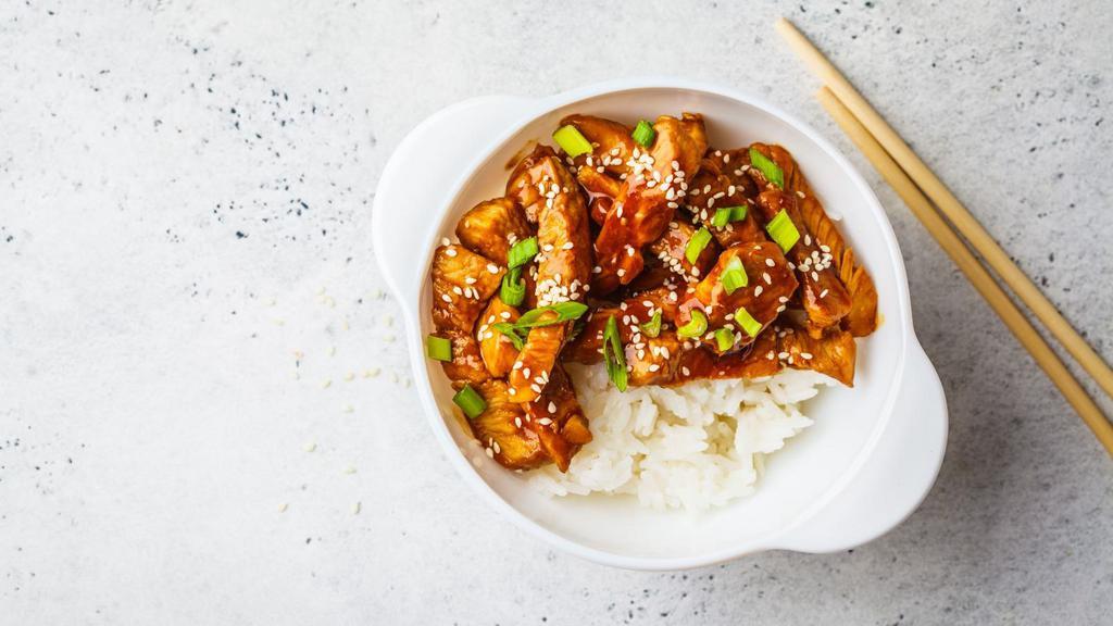 Sesame Chicken Rice Bowl · Rice bowl with chicken in sweet and sour sesame sauce.