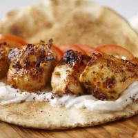 Shish Tawook Wrap · Preparation time: 15 - 20 minutes. Marinated grilled chicken tenders wrapped in pita bread w...