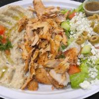 Chicken Shawarma · Chicken breast marinated with Lebanese spices shaved off a rotating spit served with garlic ...