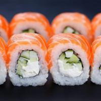 Philadelphia Roll · A twist on the California roll, we use salmon, cream cheese and sushi rice! This one is a wi...