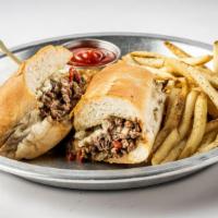 Shaved Ribeye Sandwich · Topped with Caramelized Peppers & Onions, Provolone Cheese and Horseradish Aioli