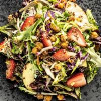 Strawberry & Quinoa Salad · Kale & Mixed Greens, Quinoa, Shaved Brussels, Roasted Chickpeas, Fresh Strawberries and Fuji...