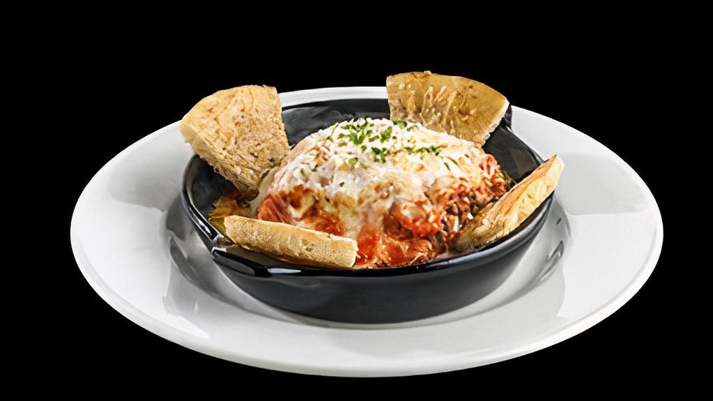 Baked Lasagna · A hearty classic, made in-house, featuring layers of pasta filled with ground beef and ricotta cheese, topped with our signature pomodoro sauce and mozzarella cheese. (2,320 Cal)