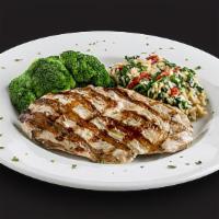 Grilled Chicken Lemonata · Lemony grilled chicken breast served with broccoli and house-made Florentine rice.