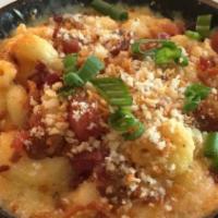 Skillet Baked Mac 'N' Cheese · Add hanger steak. Pulled chicken, bacon, toasted bread crumbs, green onion.