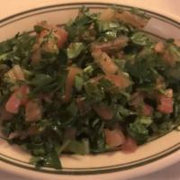 Tabouli · Vegetarian Dish. Lebanese salad, made with parsley, onions, mint, tomatoes, cracked wheat, o...