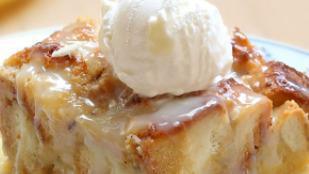 Bread Pudding · Served with vanilla Blue Bell ice cream and topped with caramel sauce