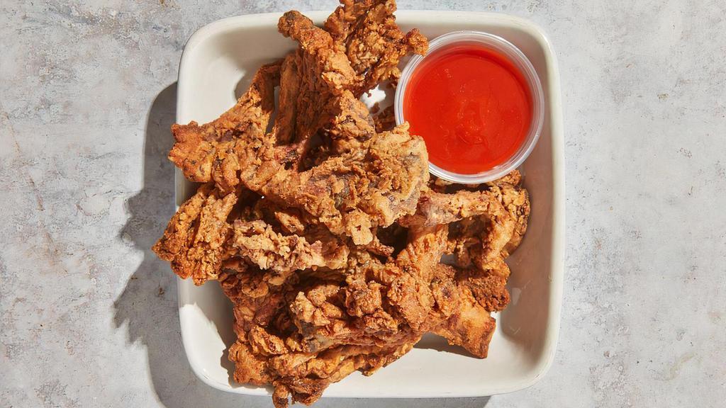 Tlc Basket · By TLC Vegan Kitchen. Crispy chicken fried oyster mushrooms with sauce on the side. Vegan. Contains nightshades. We cannot make substitutions.