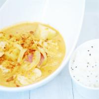 Massaman Curry · Spicy. Southern thai spices blended in chili paste with potatoes, onions, and cashew nuts, a...
