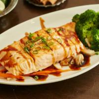 Salmon Teriyaki · Grilled salmon with teriyaki sauce served with steamed mixed vegetables.
