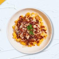 Rock With Bbq Mac · Caramelized onions, bbq cheese sauce, and roasted spicy chicken cooked in a blend of creamy ...
