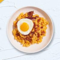 Rise & Shine Mac · Crispy bacon cooked in a blend of creamy cheese and topped with a fried egg.