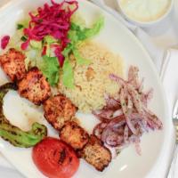Chicken Shish · Gluten free. Charcoal grilled tender chunks of marinated chicken breast skewered served with...
