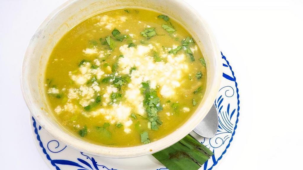 Pozole Verde · mexico city-style green tomatillo chicken soup with hominy, cilantro, poblano peppers, queso fresco, fresh lime juice