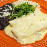 Enchiladas Queso Blanco · chihuahua, monterrey jack & munster cheese, housemade white corn tortillas, signature queso ...