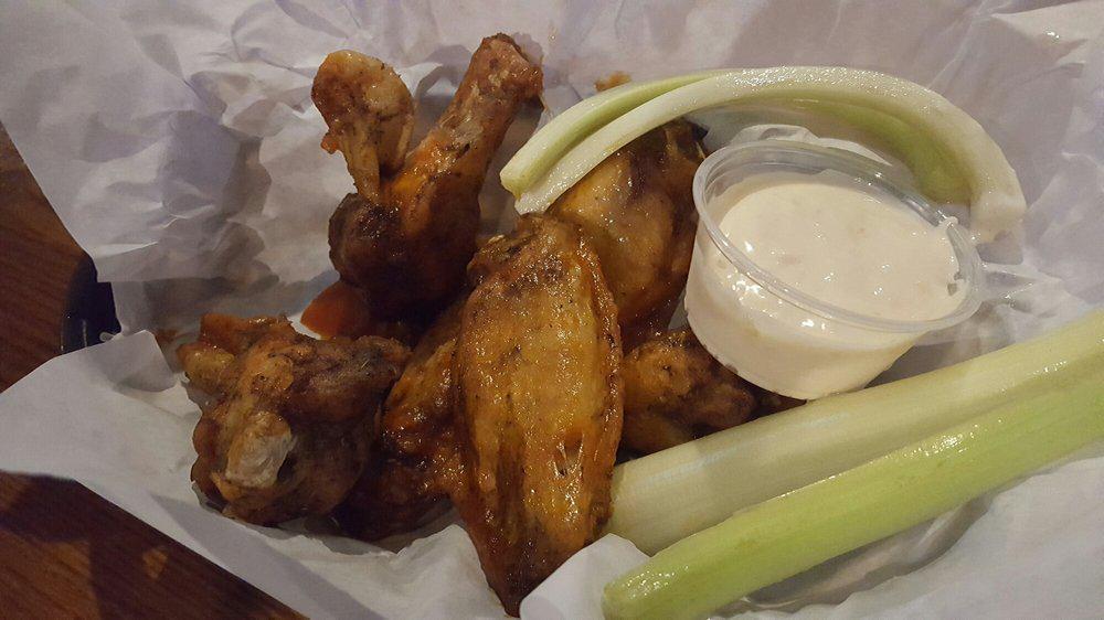 Wings (8) · Drumsticks & flats tossed in your choice of house made sauce with celery sticks and your choice of dip.