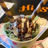 Cool Mint Oreo · Base: Mint ice cream. Topping: whipping cream, chocolate chips, chocolate wafer rolls, and c...