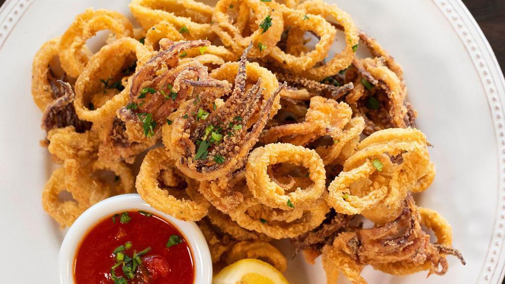 Russo’S Calamari Fritti · Tender calamari seasoned with salt and pepper, lightly fried. Served with Russo’s homemade marinara sauce.