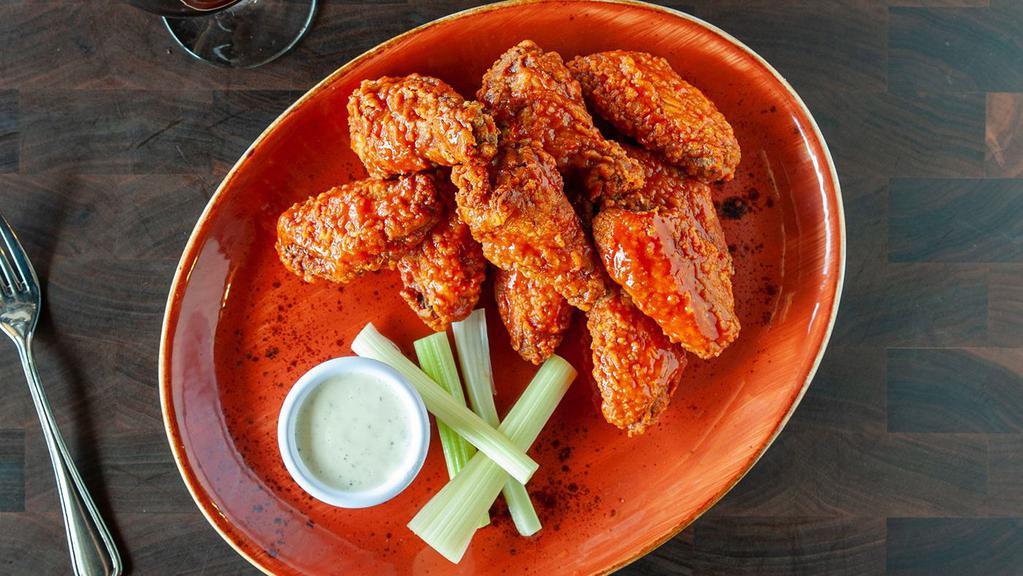 Liberty Wings · JUMBO spicy Buffalo wings served with your choice of ranch or bleu cheese dressing.