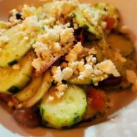 Cucumber & Feta Salad (Entree) · Fresh Italian herbs, sliced cucumber with feta cheese, Roma tomatoes, red onions, Kalamata o...