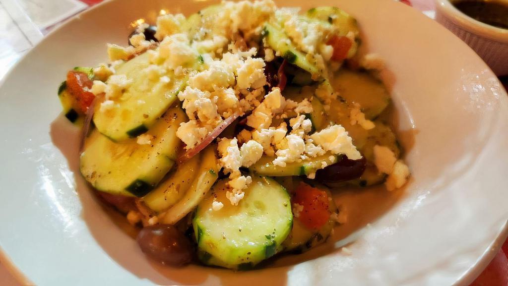 Cucumber & Feta Salad (Entree) · Fresh Italian herbs, sliced cucumber with feta cheese, Roma tomatoes, red onions, Kalamata olives, and garlic, tossed with Sicilian extra virgin olive oil.