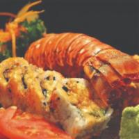 Lobster Roll · Fried lobster, crab meat, cucumber, avocado, topped with masago, eel sauce, spicy mayo and w...