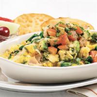 Tuscan Scramble · Eggs scrambled with our house-roasted onions, tomato, turkey, fresh spinach, mozzarella and ...