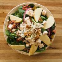 Chicken Spinach Salad · Spinach, all-natural chicken, hardwood-smoked bacon, cranberries, raisins,  . bleu cheese, r...