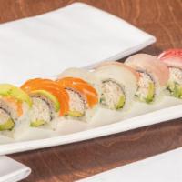 Rainbow Roll · Seaweed. Inside crab meat, avocado, and cucumber. Topped with salmon, tuna, shrimp, yellowta...