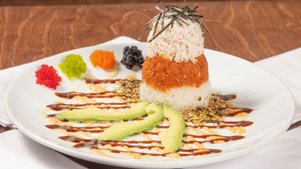 Ahi Tower · Sushi rice, avocado, crab meat, spicy tuna or salmon, seaweed, and tobiko. Comes with eel sauce, spicy mayonnaise, and wasabi sauce.
