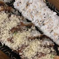 Crunch Roll-Carroll · Seaweed. Inside shrimp tempura, eel tempura, spring mix, avocado, and cucumber.