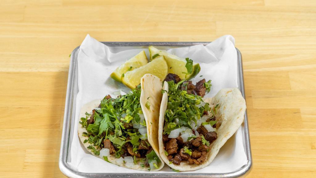 Steak Taco · 1 taco served with onions, cilantro, and lime on corn or flour.