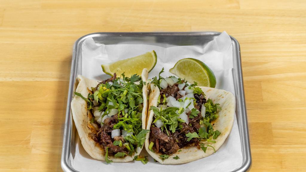 Barbacoa Taco · 1 taco served with onions, cilantro, and lime on corn or flour.
