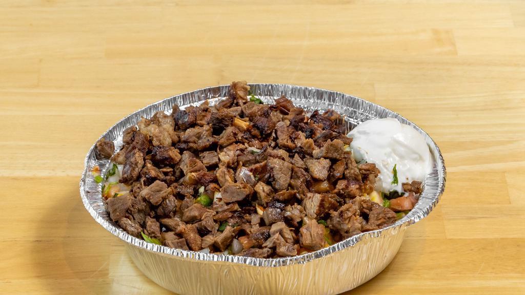 Steak Bowl · Lettuce, rice, beans, pico, cheese, and sour cream topped with meat of your choice.