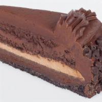 New York Turtle Cheesecake · Layers of rich chocolate cake and velvety chocolate mousse baked in a chocolate cookie crust...