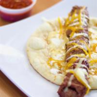 Beef Skewer Kebab Wrap · A ground beef kebab grilled on a skewer wrapped into pita bread with cheese and our signatur...