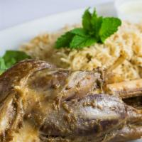 Lamb Shank With Rice · A slow cooked lamb shank to perfection served with mint sauce, lettuce and aroma rice.