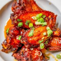 Spicy Chicken Wings · Fried chicken wings, hand-tossed in special sweet and sour spicy sauce.