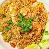 Pineapple Fried Rice · Stir-fried rice, with chicken, shrimp, egg, pineapple, cashews, and green onions.