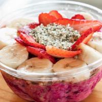 Dragon Fruit Bowl · apple juice, strawberry, dragon fruit topped with gluten-free granola, coconut oil, strawber...