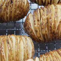 Hasselbeck Potatoes · Russet potatoes thinly sliced, roasted, and seasoned to your liking