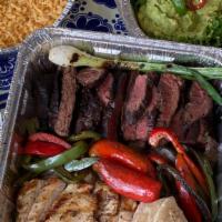 Family Style Fajitas - Combo · Feeds up to 4. Grilled Fajita Chicken and Fajita Beef with grilled onions and bell peppers. ...