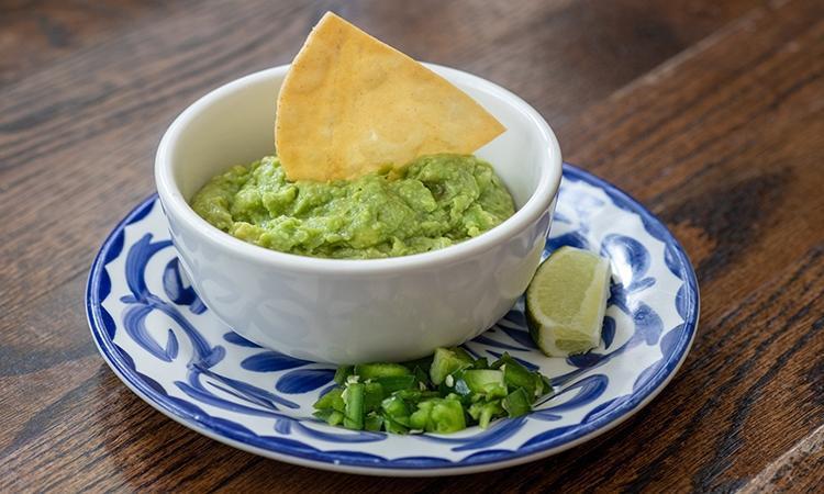 House Guacamole - Small · Our house made guacamole, served with Chips & Salsas and a side of diced fresh jalapeños and a lime wedge.