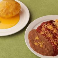 Meatless Special · Puffy Queso, Guacamole Salad, and Two Cheese Enchiladas topped with Spanish Sauce. Served wi...