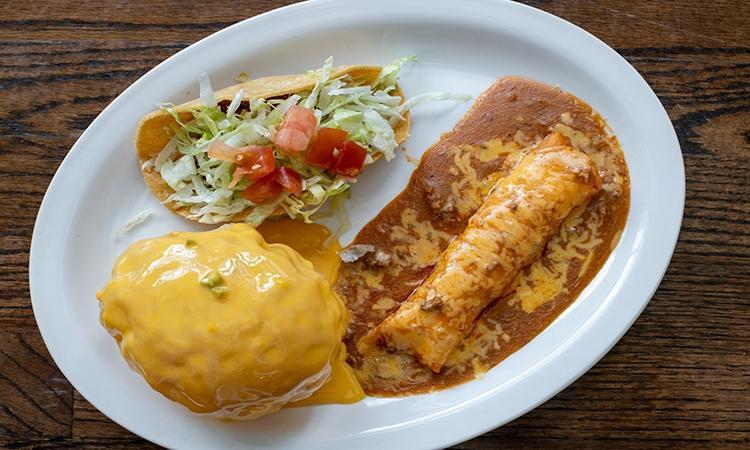 6 Combo · Crispy Beef Taco, Puffy Queso and a Cheese Enchilada. Add Mexican Rice & Beans for $2.