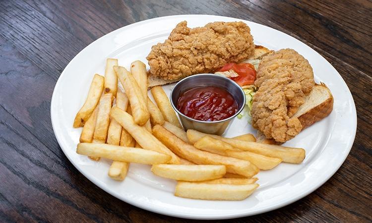 Kids Chicken Tenders · Two Crispy Chicken Tenders on white toast with choice of side.