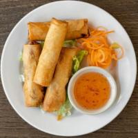 Spring Rolls (4) · Deep-fried mixed vegetables and glass noodles wrapped in rice paper served with a Thai sweet...