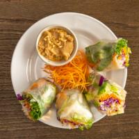 Summer Roll (2) · Fresh lettuce, carrots, cabbage, shrimp, and noodles wrapped in rice paper and served with p...