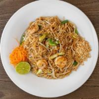 Pad Thai · Stir-fried rice noodles, eggs, sprouts and green onions in a Thai tamarind sauce, garnished ...