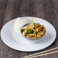 Yellow Curry · Potatoes, onions, carrots and tomatoes simmered in a coconut yellow curry sauce.